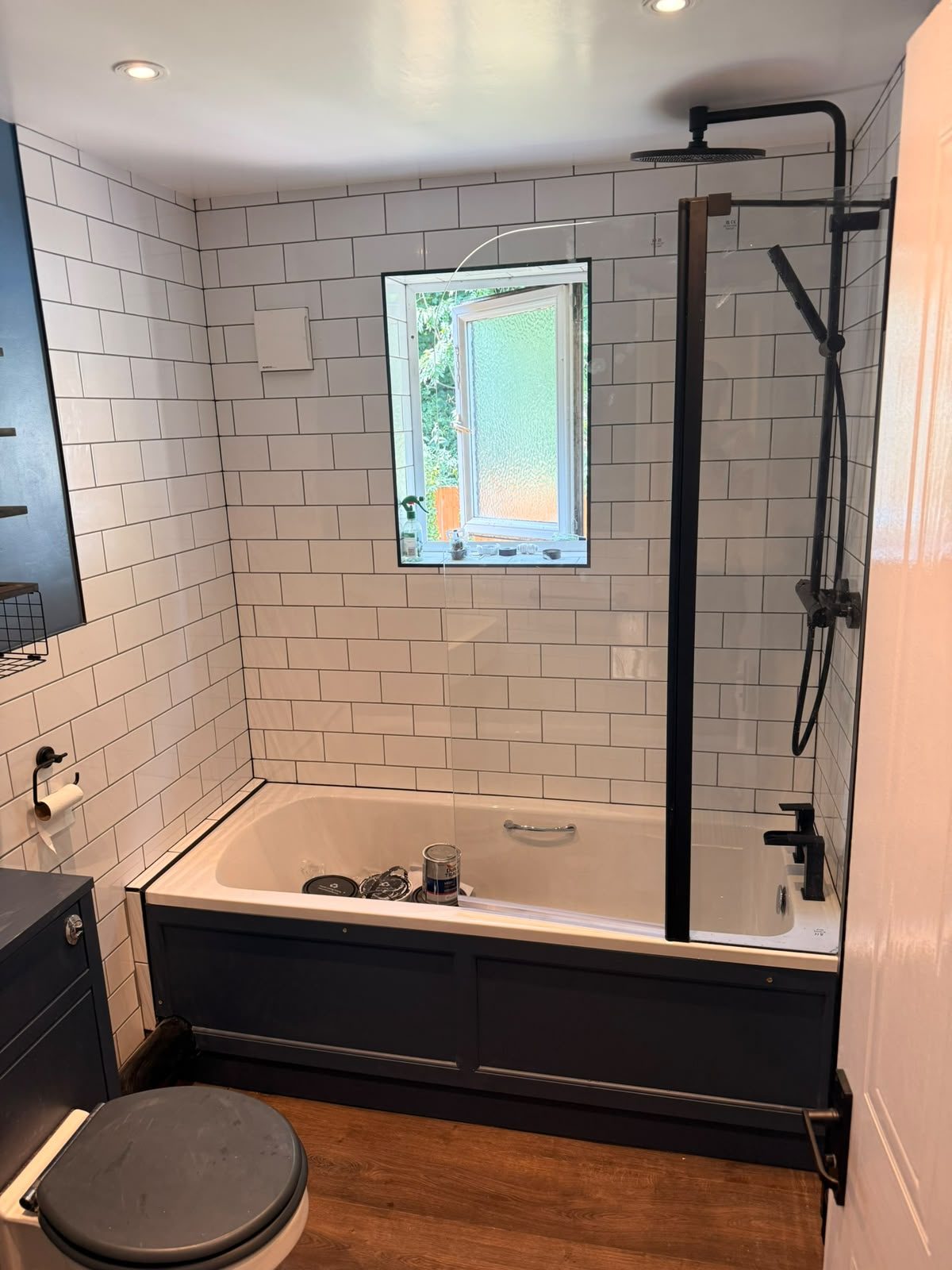 Bathroom refit with white metro tiling and matt black fittings